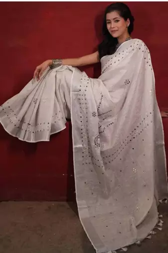 handwoven white linen saree with mirror work