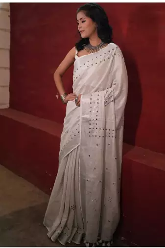 handwoven white linen saree with mirror work