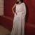 handwoven white linen saree with mirror work
