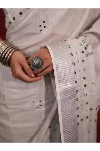 handwoven white linen saree with mirror work