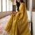 handwoven gold tissue linen saree