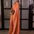 Orange handwoven tissue linen saree with mirror work