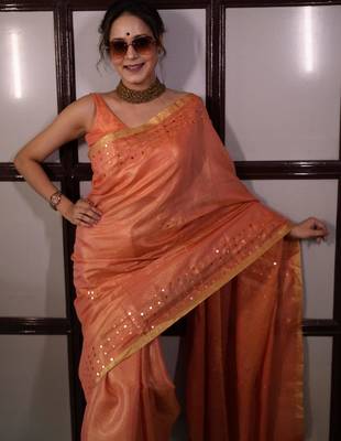 Orange handwoven tissue linen saree with mirror work 3