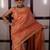 Orange handwoven tissue linen saree with mirror work