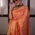 Orange handwoven tissue linen saree with mirror work