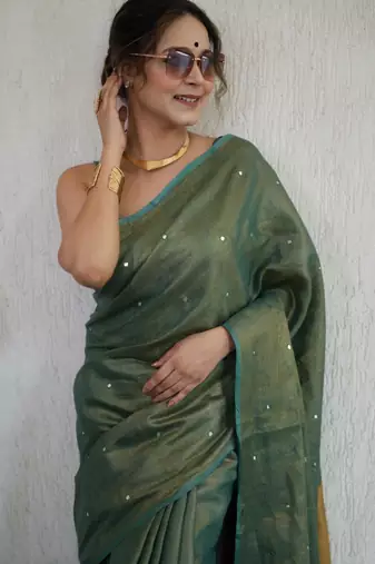 handwoven green tissue linen saree with mirror work