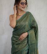 handwoven green tissue linen saree with mirror work