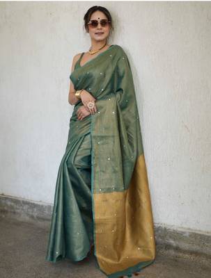 handwoven green tissue linen saree with mirror work 3