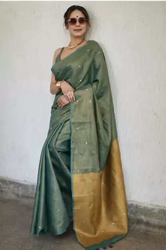 handwoven green tissue linen saree with mirror work