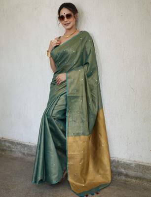 handwoven green tissue linen saree with mirror work 4