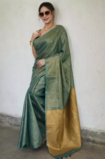 handwoven green tissue linen saree with mirror work
