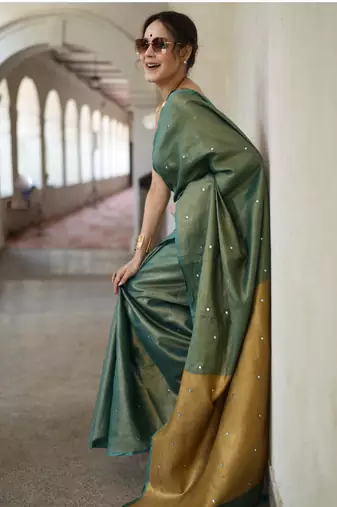 handwoven green tissue linen saree with mirror work