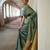 handwoven green tissue linen saree with mirror work