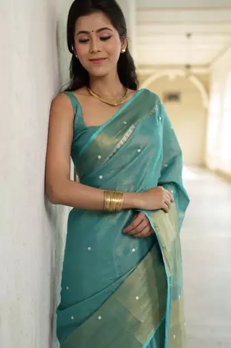 handwoven blue tissue linen saree with mirror work