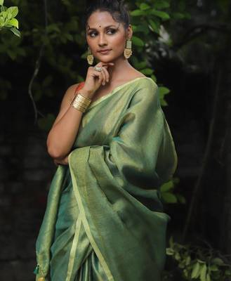 handwoven green tissue linen saree 1