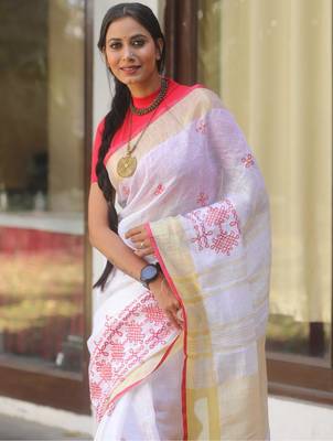handwoven white linen saree with embroidery work 4
