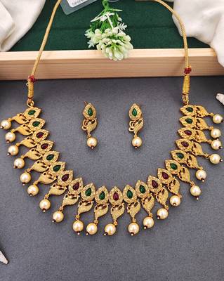 Matte gold peacock necklace set with ruby & green stones, pearl drops     ethnic bridal jewellery 1