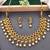 Matte gold peacock necklace set with ruby & green stones, pearl drops – ethnic bridal jewellery