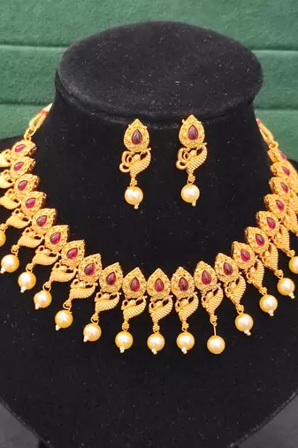 Antique gold peacock necklace set with ruby stones & pearl drops     traditional ethnic jewellery