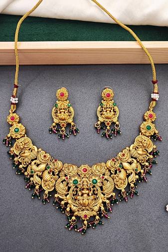 Antique gold-plated temple necklace set with lakshmi & peacock design – traditional bridal jewellery