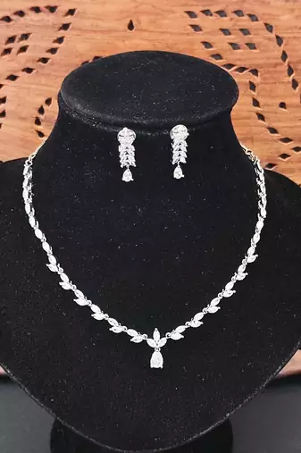 Graceful american diamond leaf design necklace set with earrings for her