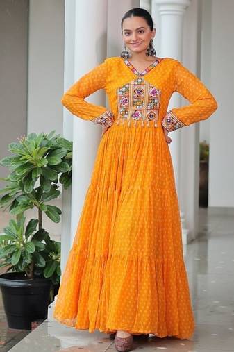 Yellow colour faux georgette laheriya print navratri gown