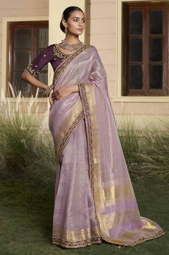 Purple embroidered fancy fabric saree with designer blouse fabric