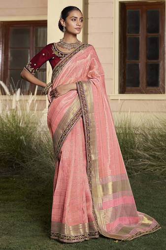 Peach embroidered fancy fabric saree with designer blouse fabric