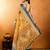 mustard crepe printed saree with unstitched blouse
