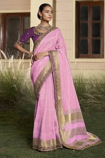 Pink embroidered fancy fabric saree with designer blouse fabric