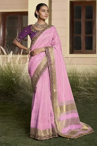 Pink embroidered fancy fabric saree with designer blouse fabric