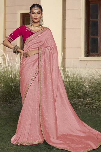 Pink embroidered fancy fabric saree with designer blouse fabric