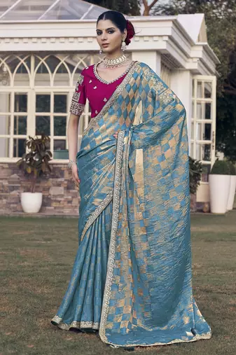 Rama embroidered fancy fabric saree with designer blouse fabric