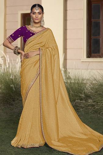 Yellow embroidered fancy fabric saree with designer blouse fabric