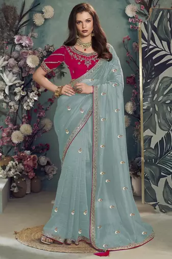 Sky embroidered fancy fabric saree with designer blouse fabric