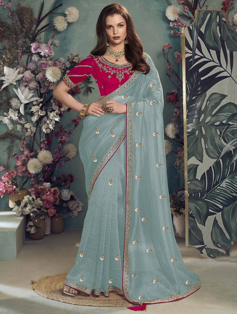Sky embroidered fancy fabric saree with designer blouse fabric