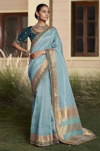 Sky embroidered fancy fabric saree with designer blouse fabric