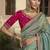 Rama embroidered fancy fabric saree with designer blouse fabric