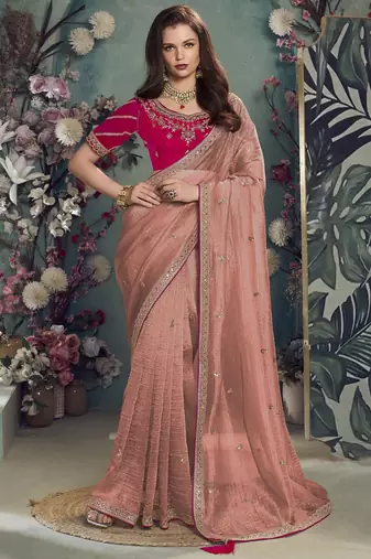 Peach embroidered fancy fabric saree with designer blouse fabric