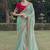Sea green embroidered fancy fabric saree with designer blouse fabric