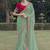 Green embroidered fancy fabric saree with designer blouse fabric