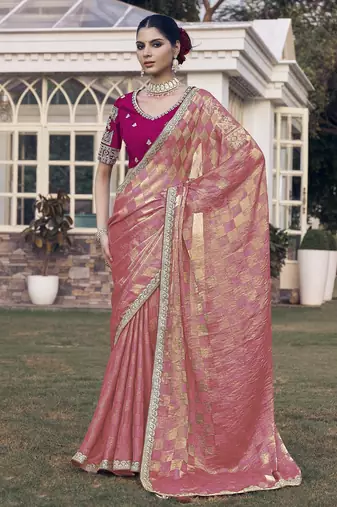 Peach embroidered fancy fabric saree with designer blouse fabric