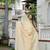 yellow chinnon zarkan work saree with unstitched blouse