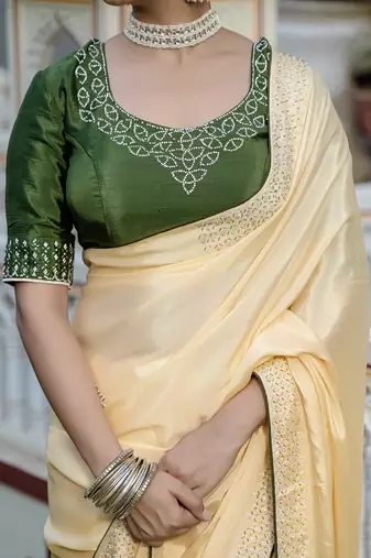 yellow chinnon zarkan work saree with unstitched blouse