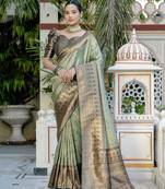 pista kanjivaram silk blend zari woven saree with unstitched blouse