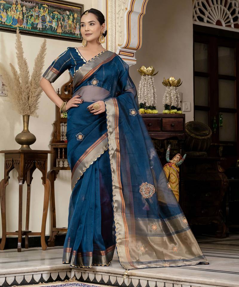 teal linen zari woven saree with unstitched blouse