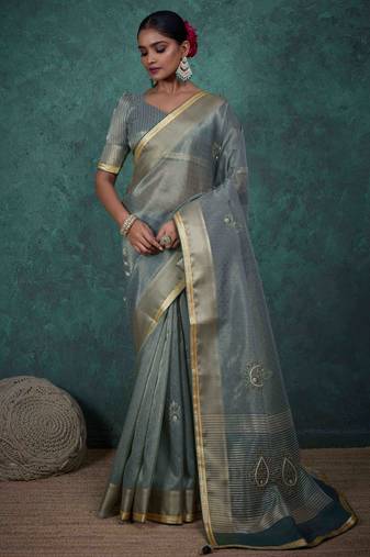 teal tissue linen zari woven saree with unstitched blouse