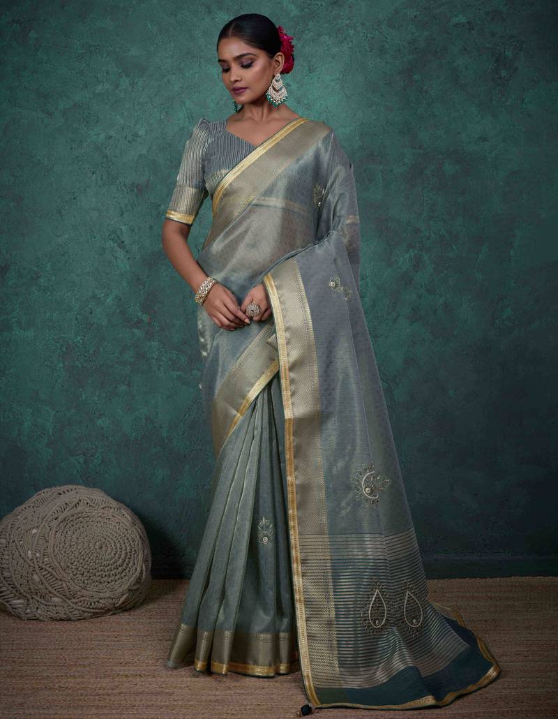 teal tissue linen zari woven saree with unstitched blouse