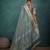 teal tissue linen zari woven saree with unstitched blouse