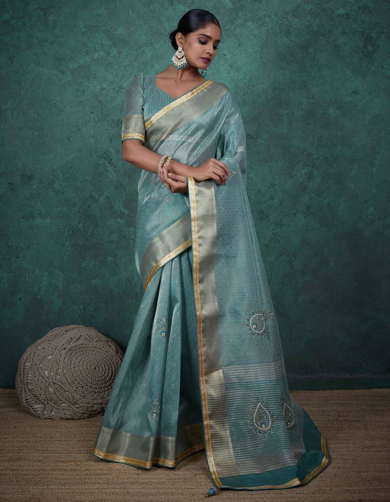 sky blue tissue linen zari woven saree with unstitched blouse